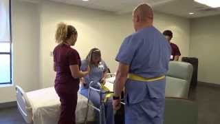 Physical Therapy Transfer Training  How To Transfer From Wheelchair To Bed [upl. by Kippy]